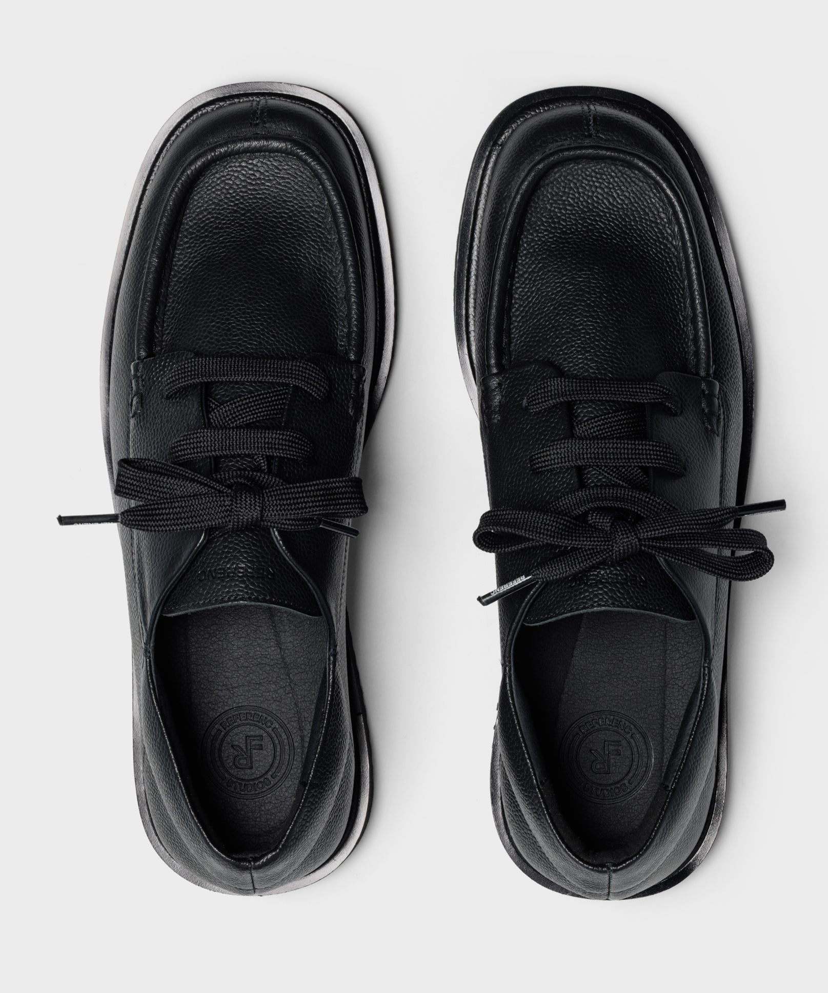 The Tahoe Resort All Black Riso Leather