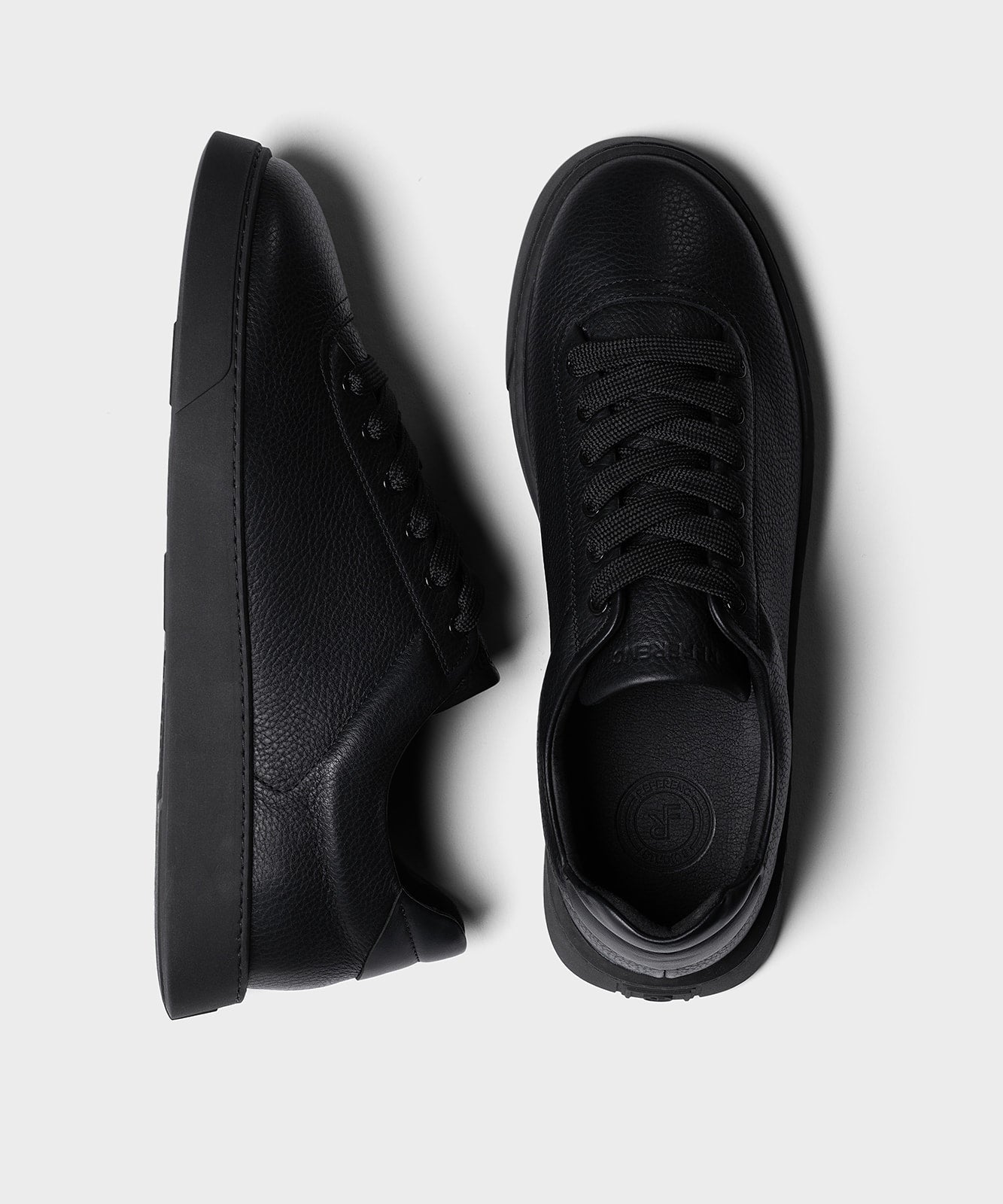 The Cassetta All Black Grained Leather